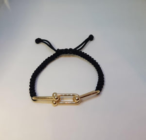 Pulsera de brass y macramé